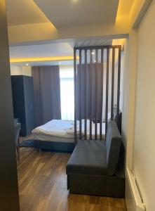 Rúm í herbergi á President Kop S2