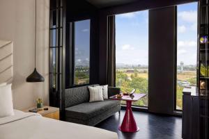 Postel nebo postele na pokoji v ubytování Hyatt Centric Juhu Mumbai