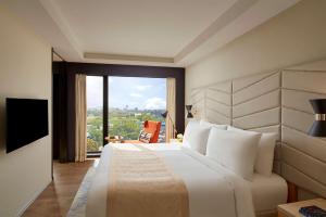 Postel nebo postele na pokoji v ubytování Hyatt Centric Juhu Mumbai