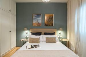 Posteľ alebo postele v izbe v ubytovaní Modern stylish 3 bedroom Arco de Triunfo