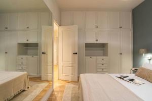 Posteľ alebo postele v izbe v ubytovaní Modern stylish 3 bedroom Arco de Triunfo