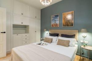Posteľ alebo postele v izbe v ubytovaní Modern stylish 3 bedroom Arco de Triunfo