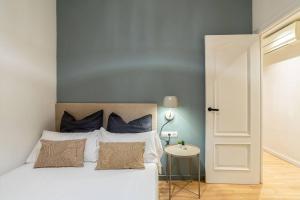 Posteľ alebo postele v izbe v ubytovaní Modern stylish 3 bedroom Arco de Triunfo