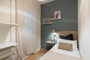 Posteľ alebo postele v izbe v ubytovaní Modern stylish 3 bedroom Arco de Triunfo