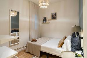 Posteľ alebo postele v izbe v ubytovaní Modern stylish 3 bedroom Arco de Triunfo + 5 fotografií