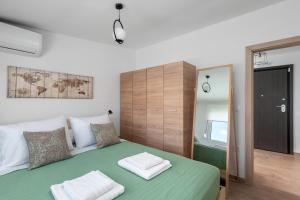 Posteľ alebo postele v izbe v ubytovaní Sky High Loft