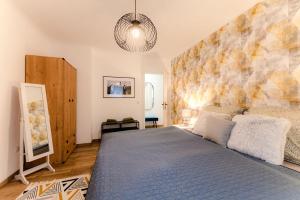 Postel nebo postele na pokoji v ubytování Birdie apartman