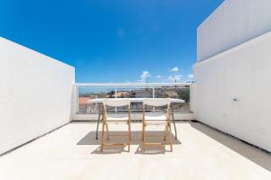 Μπαλκόνι ή βεράντα στο Exclusivo duplex no Beach TownHouse IV por Carpediem