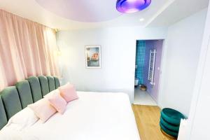 Posteľ alebo postele v izbe v ubytovaní Appartement Aquaroom RDC - Plage 50m - Rue gratuite