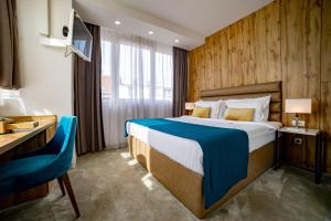 Postel nebo postele na pokoji v ubytování MARK Hotel