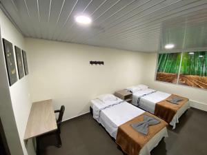 Letto o letti in una camera di Vivienda turística Arboleda de Cádiz