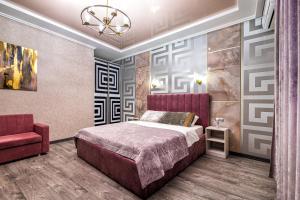 Giường trong phòng chung tại 2 - bedroom Apartments Galicia Lviv