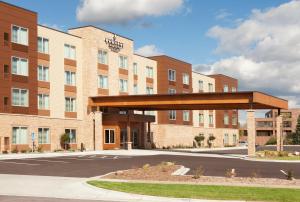 a rendering of the front of a hotel at Country Inn & Suites by Radisson, Roseville, MN in Roseville