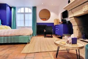 Posteľ alebo postele v izbe v ubytovaní Chambre Majorelle - RDC - Plage 50m - Rue gratuite + 14 fotografií