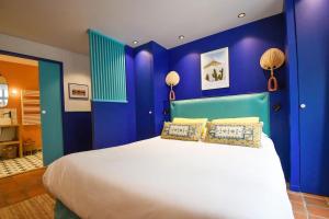 Posteľ alebo postele v izbe v ubytovaní Chambre Majorelle - RDC - Plage 50m - Rue gratuite