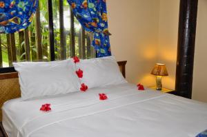 Letto o letti in una camera di West Bay Lodge and Spa