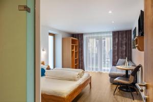 Łóżko lub łóżka w pokoju w obiekcie Apart-hochzillertal Gartenwohnung
