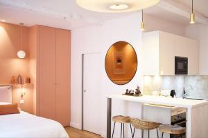 Łóżko lub łóżka w pokoju w obiekcie Appartement Dunes - Plage 50m - Rue gratuite