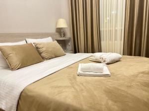 Voodi või voodid majutusasutuse Family Hotel Triston toas