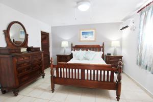 Giường trong phòng chung tại Rosalie Apt #2 by Bluescape +26 ảnh