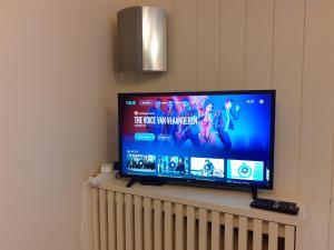 TV a/nebo společenská místnost v ubytování Home Away