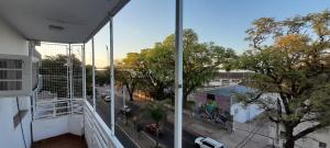a view of a street from a balcony of a building at Departamento Malvinas in Corrientes