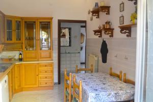 Kuchyň nebo kuchyňský kout v ubytování Appartamento in Via Calvi
