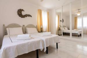 Postel nebo postele na pokoji v ubytování Casa Jerez 14 en Nerja