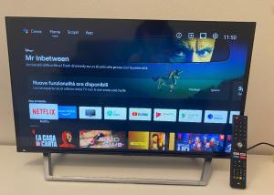 A television and/or entertainment centre at M.G Home a un passo da tutto