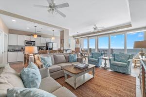 a living room with a couch and a table at La Playa 1202 in Perdido Key