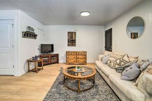 a living room with a couch and a coffee table at Cozy Blackfoot Apartment Pets Welcome! in Blackfoot