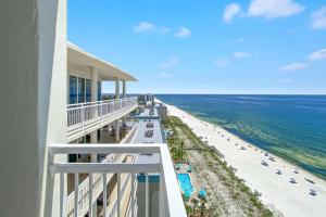 a view of the beach from the balcony of a hotel at La Playa 1202 in Perdido Key