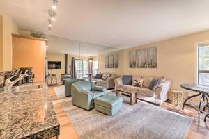 a large living room with couches and a table at Cozy Incline Village Condo Less Than 3 Mi to Lake Tahoe! in Incline Village
