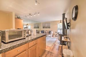 a kitchen with a counter top with a microwave at Cozy Incline Village Condo Less Than 3 Mi to Lake Tahoe! in Incline Village