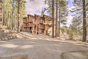 a large house in the middle of a forest at Cozy Incline Village Condo Less Than 3 Mi to Lake Tahoe! in Incline Village