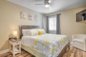 a bedroom with a bed and a chair at Arizona Condo with Community Pool and Hot Tub in Mesa +16 photos