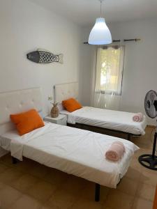 Postel nebo postele na pokoji v ubytování Corralejo, Relaxing villa , private pool , Wi-Fi