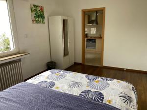 Postel nebo postele na pokoji v ubytování Apartment CHEZ TONY