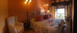 Postel nebo postele na pokoji v ubytování Hotel Doña Sancha