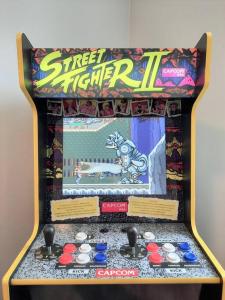 a close up of a street fighting pin game at Modern Suite in Historic Bldg. Minutes to DT in Calgary