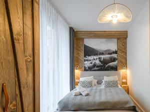 Posteľ alebo postele v izbe v ubytovaní VisitZakopane - Porto Apartment