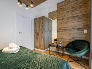 Posteľ alebo postele v izbe v ubytovaní VisitZakopane - Porto Apartment