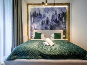 Posteľ alebo postele v izbe v ubytovaní VisitZakopane - Porto Apartment