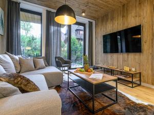 Televízia a/alebo spoločenská miestnosť v ubytovaní VisitZakopane - Porto Apartment