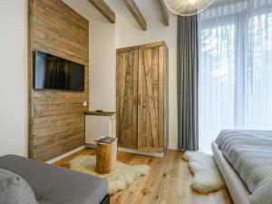 Televízia a/alebo spoločenská miestnosť v ubytovaní VisitZakopane - Porto Apartment