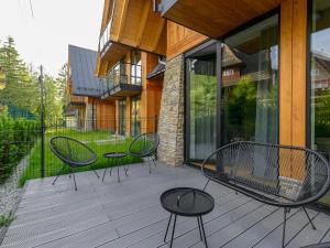 Vonkajšia záhrada v ubytovaní VisitZakopane - Porto Apartment