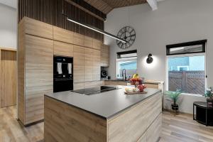 a kitchen with a large island in a room at The Lava Bowl in Grindavík