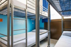 a bunk bed room with two bunk beds on a ship at Sea Hostel Barcelona in Barcelona