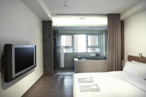 Televisyen dan/atau pusat hiburan di Just Sleep Jiao Xi