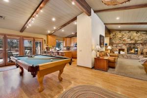 a living room with a pool table in it at 2012-Moose Manor home in Big Bear Lake